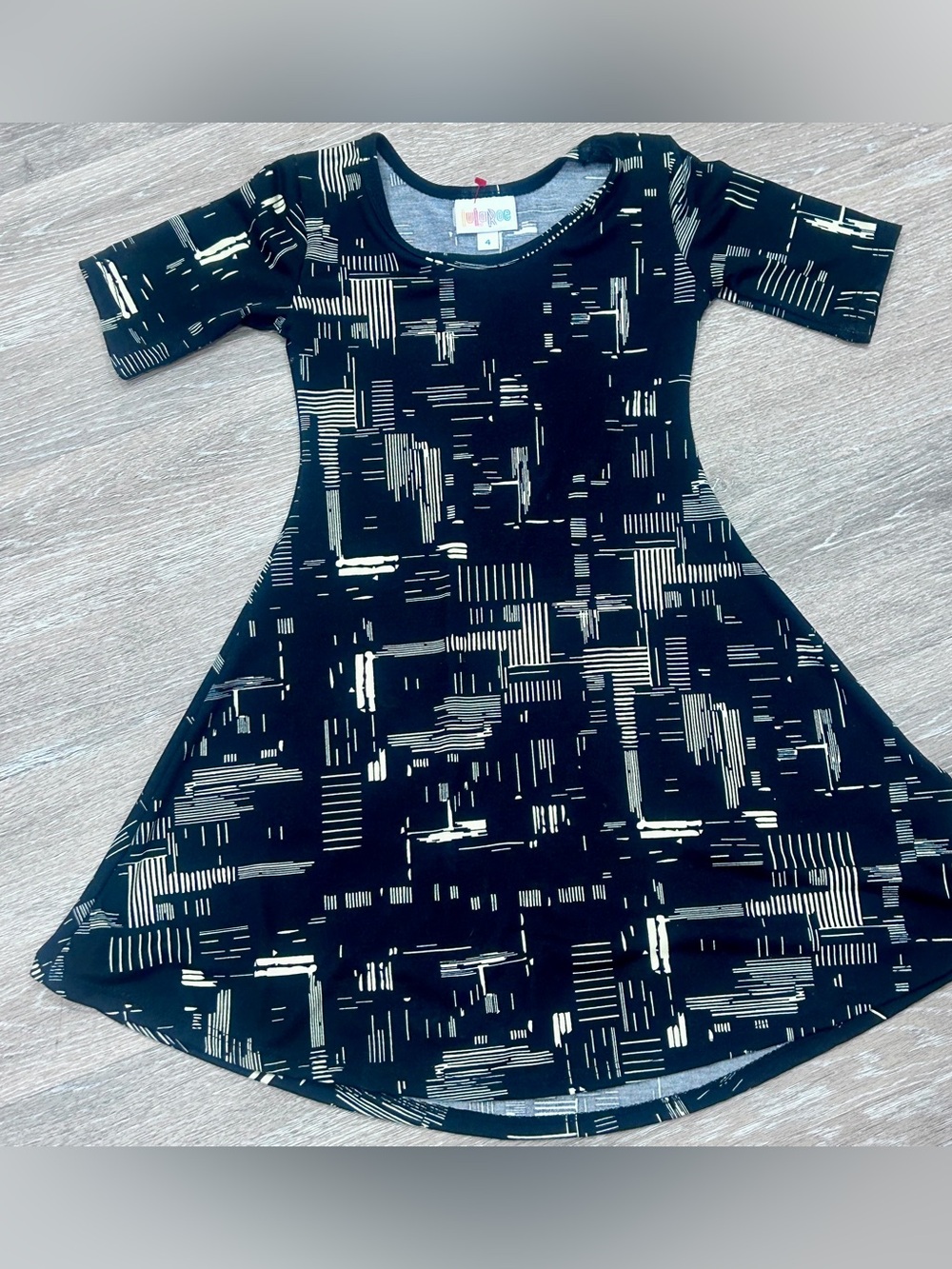 LuLaRoe Kids Dress Size 4 • Black Geometric Print • Soft Stretchy Dress